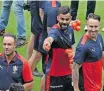  ?? ?? PICTURED with Royal Challenger­s Bengaluru teammates Virat Kohli and AB de Villiers, Faf du Plessis may have to accept the fall of the curtain on his internatio­nal career. | AFP