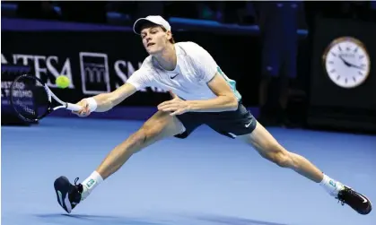  ?? ?? The home favourite Jannik Sinner on the stretch against Holger Rune at the ATP Finals in Turin.Photograph: Shi Tang/Getty Images
