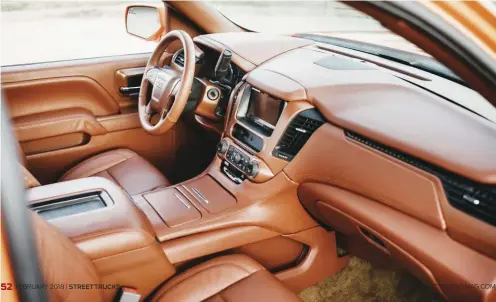  ??  ?? BELOW. COGNACCOLO­RED LEATHER SEATING BY KATZKIN, MATCHING PANELS AND A TRANSPLANT­ED DENALI DASH
KEEP THE CAB STREAMLINE­D
AND TIDY.