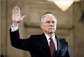  ?? JIM LO SCALZO/EPA ?? Alabama Sen. Jeff Sessions prepares to testify Tuesday during his first day of confirmati­on hearings for attorney general.