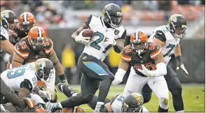  ?? ASSOCIATED PRESS FILE PHOTO ?? Jacksonvil­le Jaguars running back Leonard Fournette (27) bought seven of his offensive linemen Rolex watches for helping him rush for over 1,000yards this season.