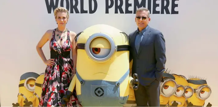  ??  ?? A Minion reasons to smile: Kristen Wiig and Steve Carell arrive at the World Premiere of Despicable Me 3 at the Shrine Auditorium in Los Angeles on Saturday