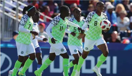  ??  ?? Falconets’ Rasheedat Ajibade (right) celebratin­g after she scored the only goal of Nigeria’s 1-0 defeat of Haiti at the ongoing FIFA U-20 Women’s World Cup France 2018 in Saint-Malo, France…yesterday