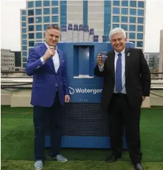  ?? (Courtesy Watergen) ?? MARCOS PONTAS (right) and Dr. Michael Mirilashvi­li