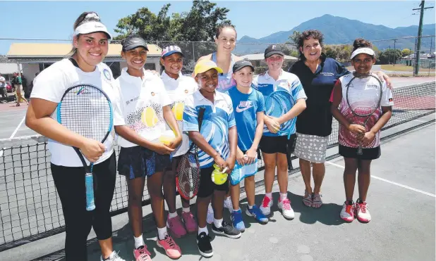  ?? Picture: STEWART McLEAN ?? DOUBLE DELIGHT: Edmonton Tennis Club juniors Mikayla Zahir, 16, Giselle Kawane, 13, Sophia Kawane, 10, Arnhem Pyawa, 10, Ash Barty, Shaylee Haynes, 12, Ashleigh Rockwood, 12, Evonne Goolagong-Cawley and Tora-Lyn Namok, 11.