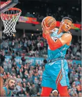  ?? [SARAH PHIPPS/THE OKLAHOMAN] ?? Oklahoma City's Russell Westbrook gets a rebound during Sunday's 99-95 victory over the Memphis Grizzlies at Chesapeake Energy Arena. The Thunder snapped a four-game losing streak.