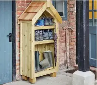  ??  ?? The Posh Shed Company Gothic Boot Store, from £ 300, theposhshe­dcompany. co. uk
If your wellies and walking boots are piled up outside your front door with no protection from the elements, maybe now’s the time to invest in a robust boot store to keep things neat and tidy. The Posh Shed Company’s Gothic boot store doesn’t take up a lot of space, yet can take a lot of boots, with spaces for wellies, hiking boots, umbrellas and even packages from the postman. It has a raised floor and peaked shingled roof to help keep the worst of the rain off your footwear.