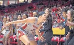  ?? ROBERTO E. ROSALES/JOURNAL ?? Lobo forward Nike McClure celebrates after blocking one of her six shots on Friday night against Texas State. UNM had a team-record 16 blocked shots.