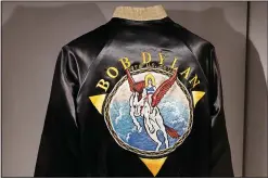  ?? (AP/Sue Ogrocki) ?? A tour jacket from 1978 is displayed at the Bob Dylan Center.