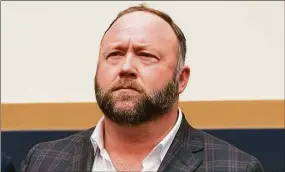  ?? J. Scott Applewhite / Associated Press file photo ?? Alex Jones’ favorite Texas lawyer will be allowed to sit at his defense table during the Sandy Hook defamation awards trial in Connecticu­t in September, as long as the out-of-state attorney doesn’t actively try the case.