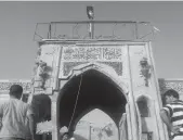  ?? — AP ?? People inspect the destroyed Jonah’s tomb in Mosul, Iraq, on Thursday.