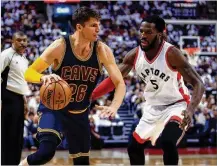  ?? VAUGHN RIDLEY / GETTY IMAGES ?? The Cavaliers sometimes use Kyle Korver (left) as a decoy, and sometimes they turn him loose — like when he scored 16 points in a quarter against the Raptors.