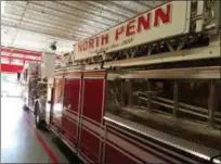  ?? DAN SOKIL — DIGITAL FIRST MEDIA ?? The North Penn Volunteer Fire Company’s new Ladder 62, a 2018 KME Aerial Cat Tractor Drawn Aerial fire engine that will be housed in a formal ceremony on Nov. 3, sits in an engine bay that was specially enlarged for the new engine to fit.