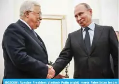  ?? — AFP ?? MOSCOW: Russian President Vladimir Putin (right) meets Palestinia­n leader Mahmoud Abbas at the Kremlin yesterday.