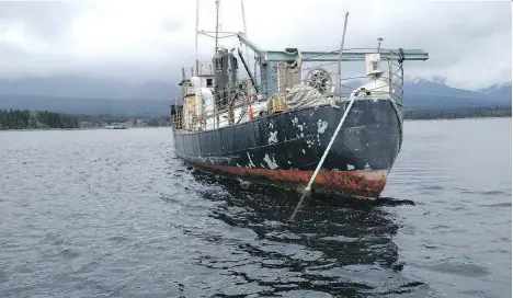  ?? PAUL KYBA/FILES ?? A 2012 Transport Canada report identifies 240 abandoned vessels on Canada’s coasts, including 42 in B.C. One of them, the historic Laurier II, was towed from Deep Bay to Ladysmith on Vancouver Island last month after fears a leak would sink it and...