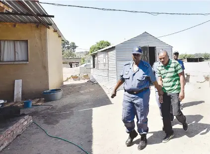  ?? Pictures: Nigel Sibanda ?? GAME OVER. John Peter Kadiubu is arrested in Oukasie, North West, after his ‘surgery’ is raided on Friday.