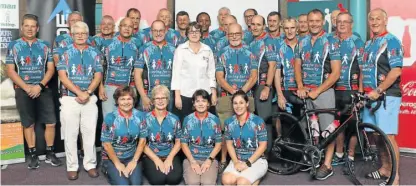  ?? Picture: MADELEINE CHAPUT ?? SADDLED UP: Grandads Army cyclists, supporters and sponsors line up for the fourth annual Rob Burton Memorial ride.