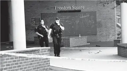  ?? KIM HAIRSTON/BALTIMORE SUN ?? Three people were shot and injured on the Towson University campus early Saturday morning, Baltimore County police and school officials said. Officials said the shooting occurred in Freedom Square, a location where students are known to congregate.