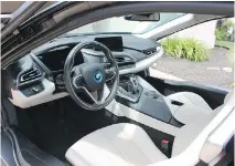  ??  ?? The 2016 BMW i8’s interior looks more like a spaceship than a car.