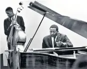  ??  ?? Randy Weston at the piano in 1961 with bassist Ron Carter