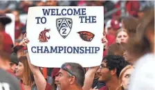  ?? JAMES SNOOK/USA TODAY SPORTS ?? A Washington State fan holds up a Pac-2 sign during the football game against Oregon State in September.