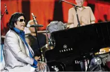  ?? —AFP photos ?? In this file photo taken on July 3, 2011, Little Richard performs during the annual PBS “A Capitol Fourth” concert at the US Capitol in Washington, DC.