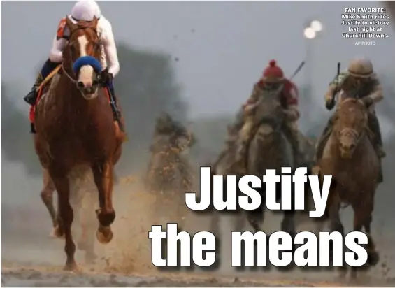  ?? AP PHOTO ?? FAN FAVORITE: Mike Smith rides Justify to victory last night at Churchill Downs.