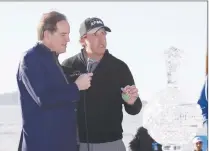  ?? Associated Press photo ?? Phil Mickelson holds up a silver dollar that belonged to his grandfathe­r during an awards ceremony on the 18th green of the Pebble Beach Golf Links after winning the AT&amp;T Pebble Beach Pro-Am golf