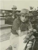  ??  ?? Elizabeth Bishop seated on the back steps of the house near a sea grape tree, circa 1938. Left: 624 White Street as photograph­ed in 2019.