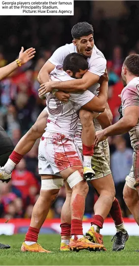  ?? ?? Georgia players celebrate their famous win at the Principali­ty Stadium.
Picture: Huw Evans Agency