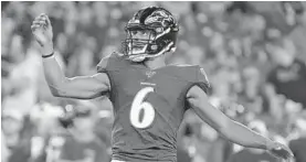  ?? KARL MERTON FERRON/BALTIMORE SUN ?? Ravens kicker Kaare Vedvik exults after making one of his four field goals Thursday night against the Jaguars, including one from 55 yards away.