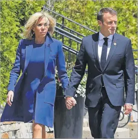  ?? AFP ?? El matrimoni Macron, en un acte oficial.