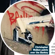  ?? ?? Christophe­r Walken paints over the Banksy