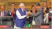  ?? (afp) ?? India’s PM Narendra Modi (left) and Indonesia’s President Joko Widodo at the G20 presidency handover ceremony in Nusa Dua on Wednesday