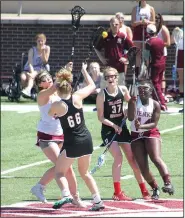  ?? Courtesy photo ?? Members of the NWA Black Diamonds vie for the ball against players from Jenks, Okla., during a game last season.