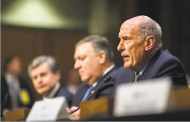  ?? Zach Gibson / Bloomberg ?? Dan Coats, director of national intelligen­ce, testifies on global threats, including meddling in U.S. elections.