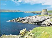  ??  ?? Mousa Broch on Mousa island in the Shetlands, above