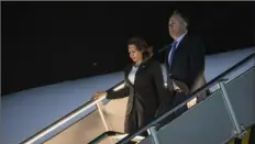  ?? The New York Times ?? Vice President Kamala Harris and her husband, Doug Emhoff, arrive Sunday at Ninoy Aquino Internatio­nal Airport in Manila, Philippine­s.