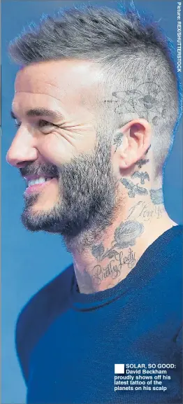  ??  ?? SOLAR, SO GOOD: David Beckham proudly shows off his latest tattoo of the planets on his scalp