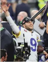  ?? GETTY IMAGES ?? Fresh off a Super Bowl victory, Rams quarterbac­k Matthew Stafford agreed to a four-year extension that includes $135 million guaranteed.