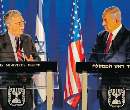  ?? ODED BALILTY / AFP / GETTY IMAGES ?? Israeli Prime Minister Benjamin Netanyahu, right, speaks with the U.S. National Security Advisor John Bolton, in Jerusalem last week. David Rubin writes that what Israel wants from the U.S. is political backing on the world stage.