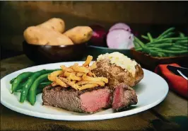  ?? COURTESY OF DUFFY’S SPORTS GRILL IMAGE ?? Indulge Dad in Duffy’s top sirloin and a compliment­ary pint of beer this weekend.