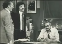  ?? File photo ?? A scene from the ABC Television Network’s “Barney Miller.” Hal Linden, right, stars as Barney Miller, Ron Glass, center, as Harris, and Steve Landesberg as Dietrich.