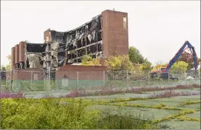  ?? Lori Van Buren / Albany Times Union ?? The derelict Leonard Hospital in Troy is finally being demolished decades after closing. The city rejected a developer who offered to buy it for $1.