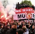  ??  ?? United fans protesting at Old Trafford on Sunday