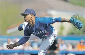  ?? AP PHOTO ?? Toronto Blue Jays starting pitcher Marcus Stroman follows through on a pitch to the Tampa Bay Rays during the third inning of a spring training baseball game Sunday in Dunedin, Fla.