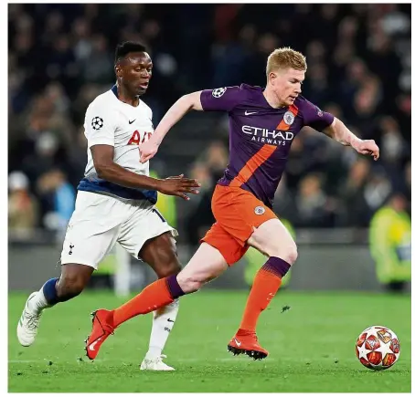  ?? — Reuters ?? Eyes on the ball: Tottenham’s Victor Wanyama (left) vying for the ball with Manchester City’s Kevin De Bruyne during the Champions League quarter-final, first-leg match at the Tottenham Hotspur Stadium on Tuesday.