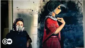  ??  ?? Shamsia Hassani is Afghanista­n's first female street and graffiti artist (photo from 2020)