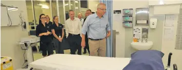  ??  ?? Australian PM Scott Morrison tours the North West Point detention Centre on Christmas Island.