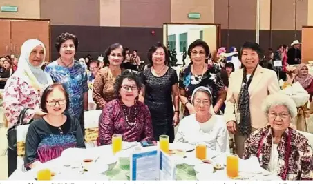  ??  ?? The group of former SMK St Teresa principals and retired teachers were much sought after for photo ops with Teresians who couldn’t get enough wefies with them.